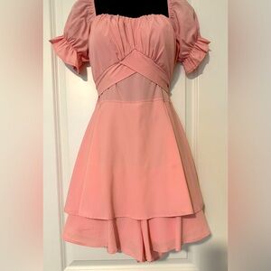 Off the shoulder one piece skort romper.